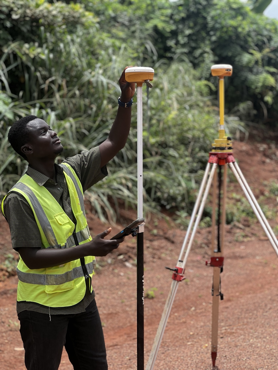 Surveyor using GNSS equipment